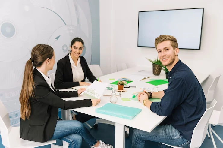 B2B appointment setting team meeting with sales professionals reviewing client data and scheduling strategies