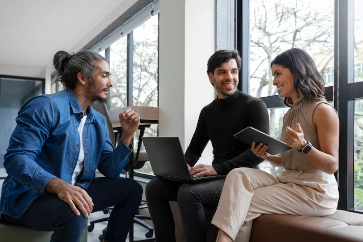 Business professionals discussing pay per lead cold email campaigns strategy in modern office setting
