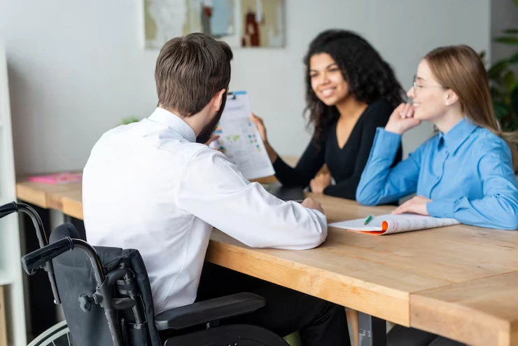 Business consultant presenting appointment scheduling strategies to two professionals during office meeting